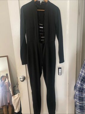 bebe Black Long-Sleeve Plunge Jumpsuit with Bar Accents